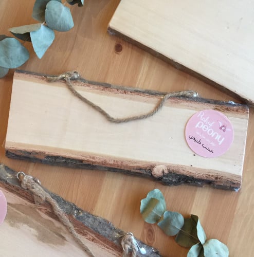 تعليقة خشب مع حبل خيش