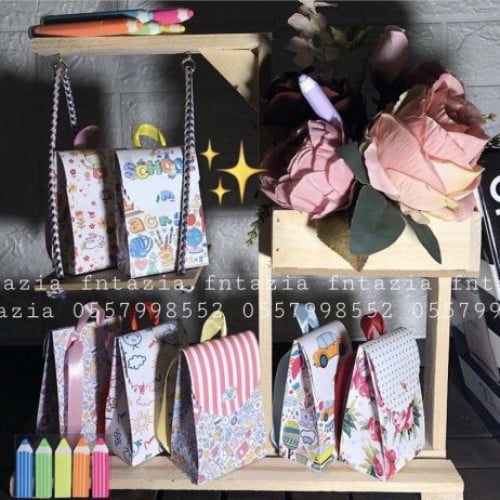 توزيعات شنط مدرسيه