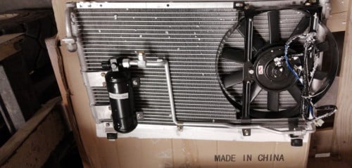 CONDENSER ISUZU UNIVERSAL WITH FAN PIPES AND DRIER 24V NO 12075C