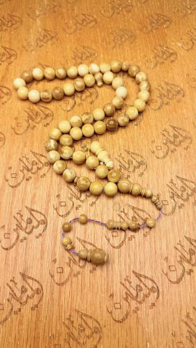 سبحة كوك ابيض ١١ ملي ٥١ خرزة ملكي خراطة القرش