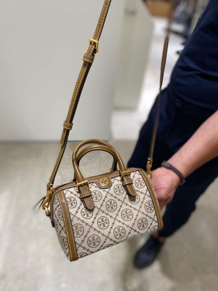 Tory Burch - Introducing the #TMonogram Barrel bag. Luxury meets utility in  a classic silhouette with our signature jacquard pattern. #ToryBurchFW21  Discover more
