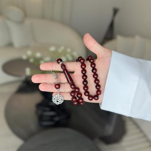 مسباح بكلايت ( احمر معرّق )