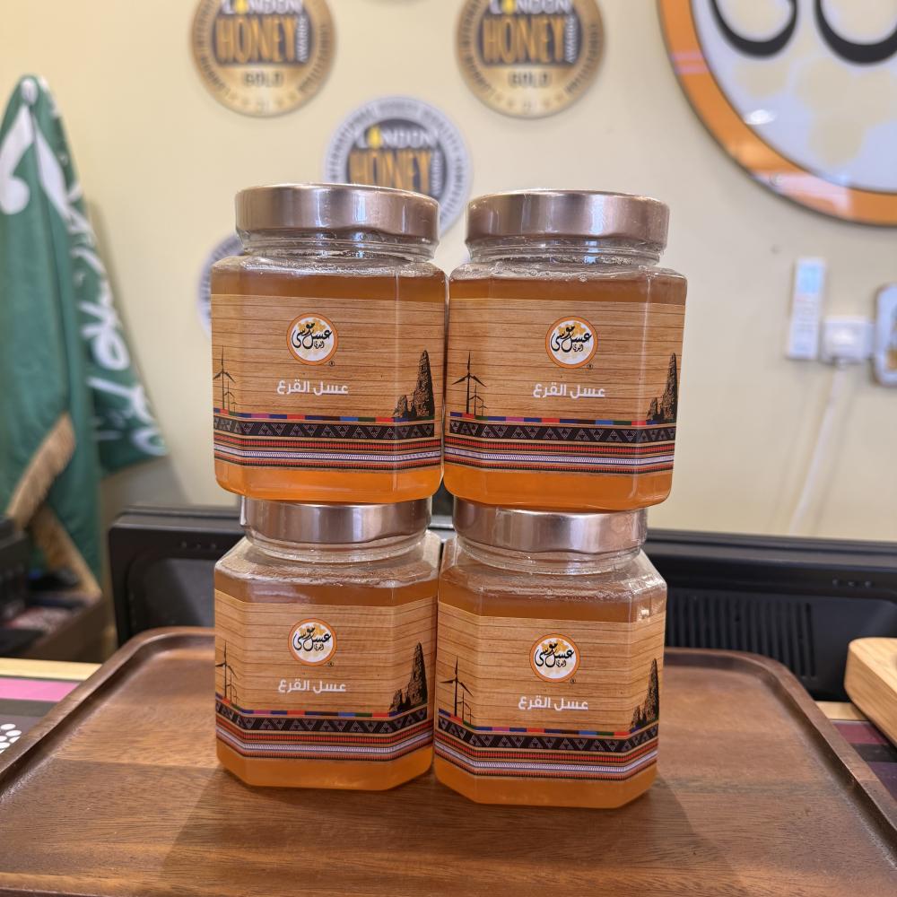 عرض أربع عبوات  عسل القرع البلدي - 2 كيلو
