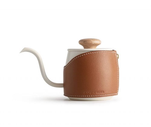 ابريق ترشيح ابيض تلبيسة جلد