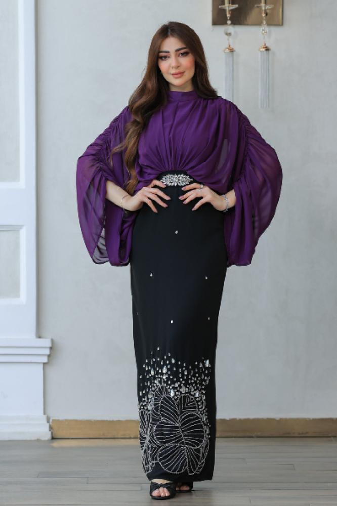 فستان سهرة أنيق يجمع بين الفخامة والرقي