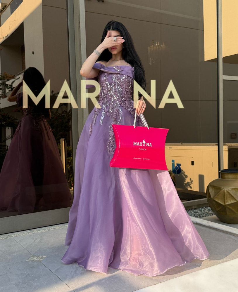 فستان نجود (فستان اورجنزا كلوش أنيق)