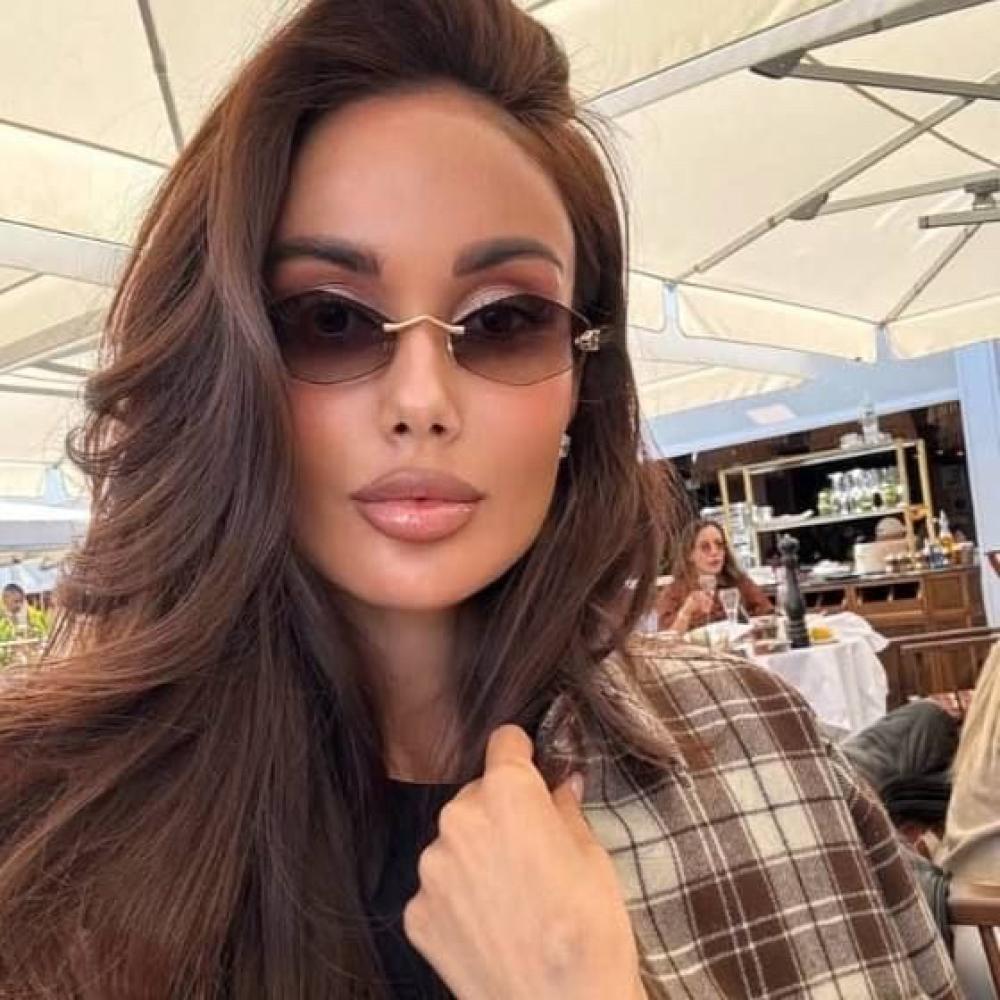 نظارة كارتير بعدسة هندسية بدون إطار باللون البني