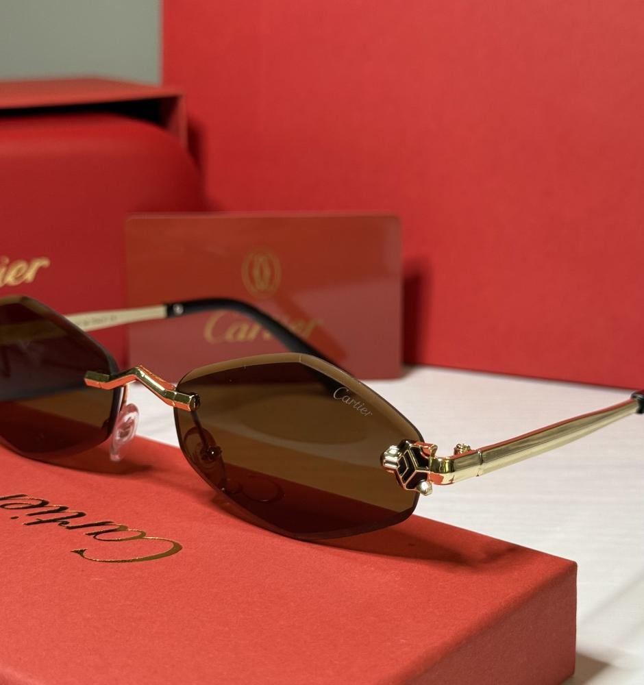 نظارة كارتير بعدسة هندسية بدون إطار باللون البني