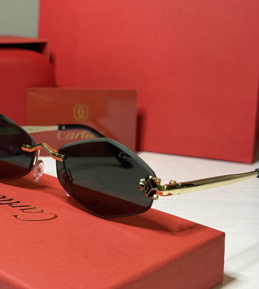 نظارة كارتير بعدسة هندسية بدون إطار باللون الاخضر الغامق