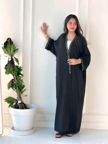Black abaya with green stone