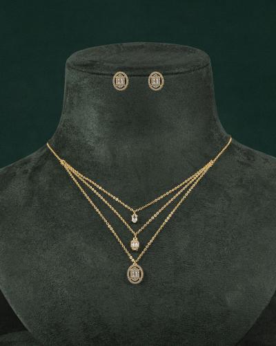 طقم شوكر سلسال وحلق مزين بالزركون تصميم ذهبي