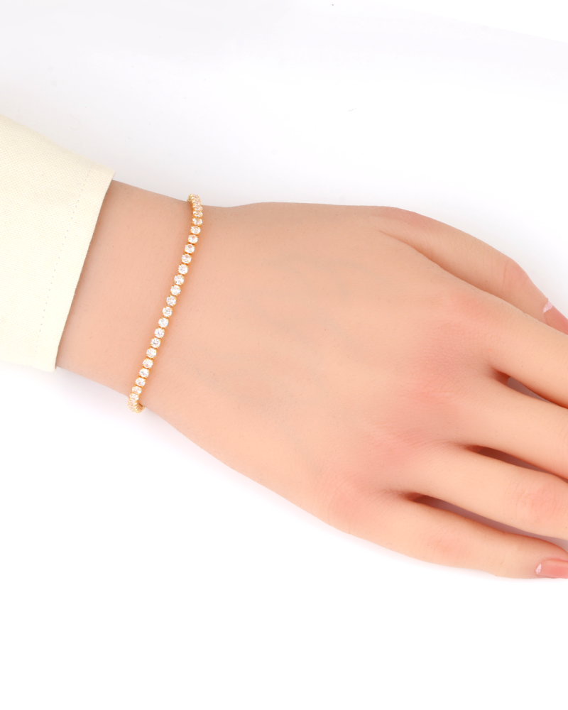 اسوارة تنس نسائية ذهبية مزينة بالزركون