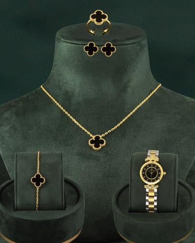 ساعة نسائية ذهبية بميناء أسود مع طقم مجوهرات بتصمي...