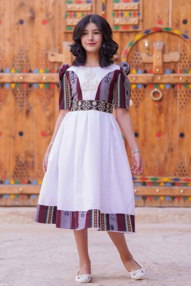 فستان يوم التأسيس بشكل سيفين