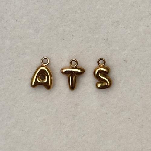 Tiny golden letter