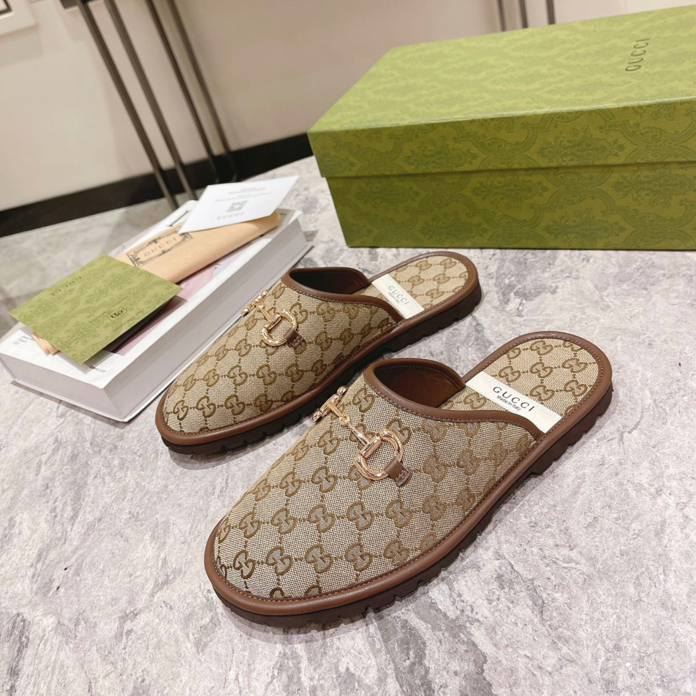 Gg supreme slippers by Gucci