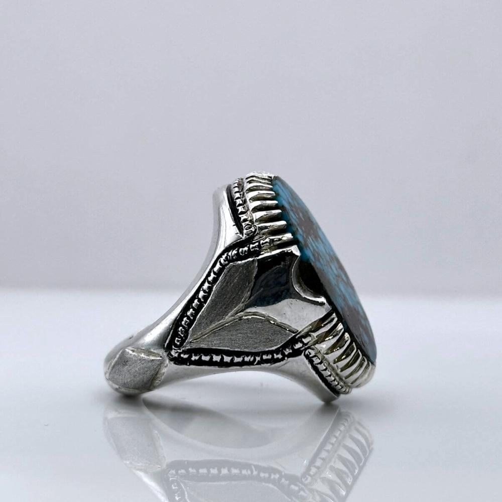 خاتم فيروز نيشابوري بصياغة ثقيلة وحجر طبيعي