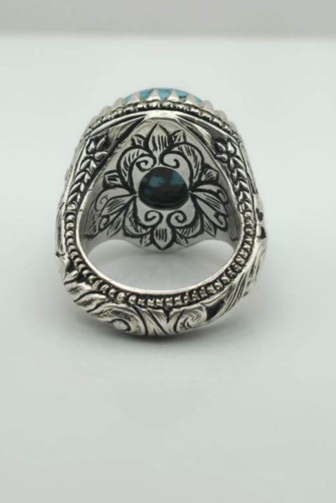 خاتم فيروز بصياغة فاخرة ونقش داخلي