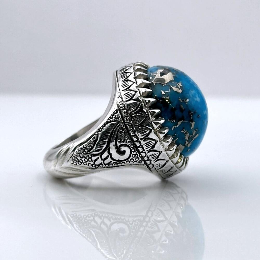 خاتم فيروز نيشابوري ممعدن حجر نادر وصياغة فاخرة