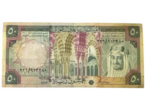 عملة عهد الملك خالد عليها صورة الملك فيصل