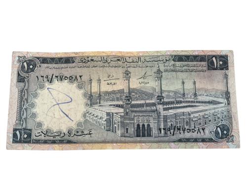 عملة الملك فيصل بحالة نظيفة والوان فاتحة مع وجود ا...
