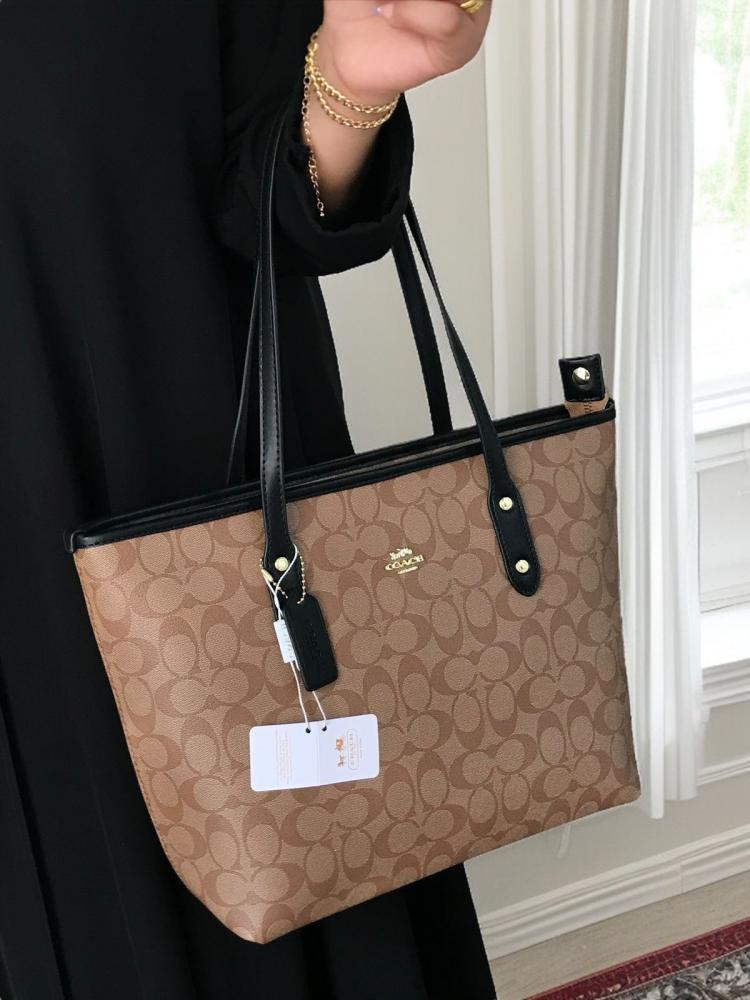 حقيبة كوتش توت باق سحاب يد اسود