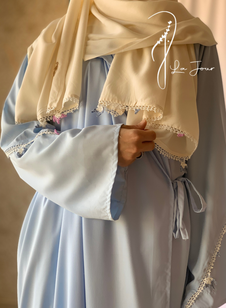 Sky blue wrap prayer sheet decorated with hand crochet