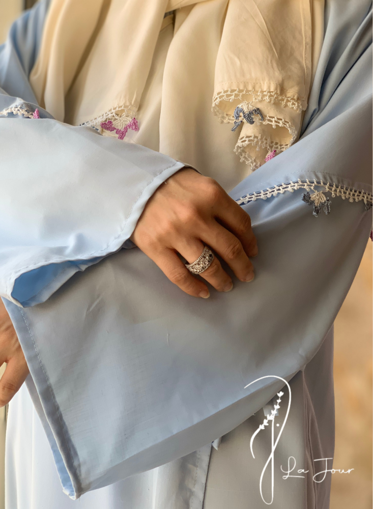 Sky blue wrap prayer sheet decorated with hand crochet