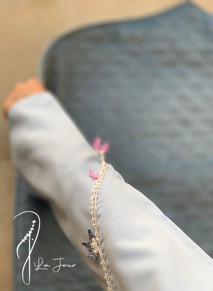 Sky blue wrap prayer sheet decorated with hand crochet