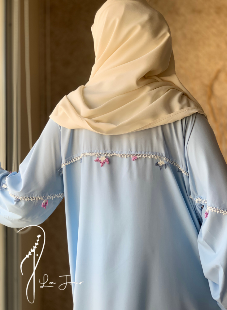 Sky blue wrap prayer sheet decorated with hand crochet