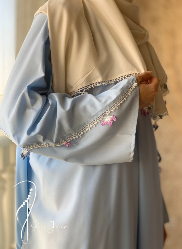 Sky blue wrap prayer sheet decorated with hand crochet