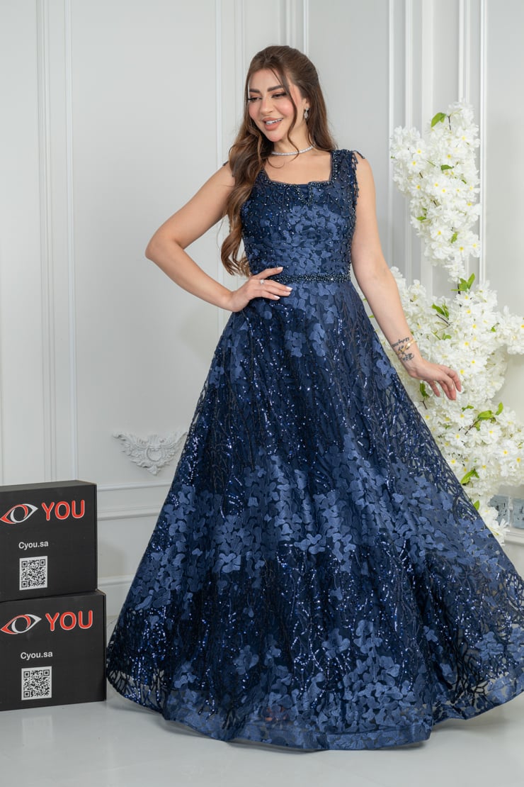 most modern dress A silver evening dress with sparkling embroidery and an elegant wide cut, a  sophisticated design suitable for parties and evenings, giving you an