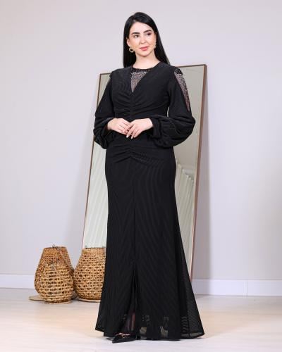 فستان سهرة أسود بتفصيل كسرات أنيق