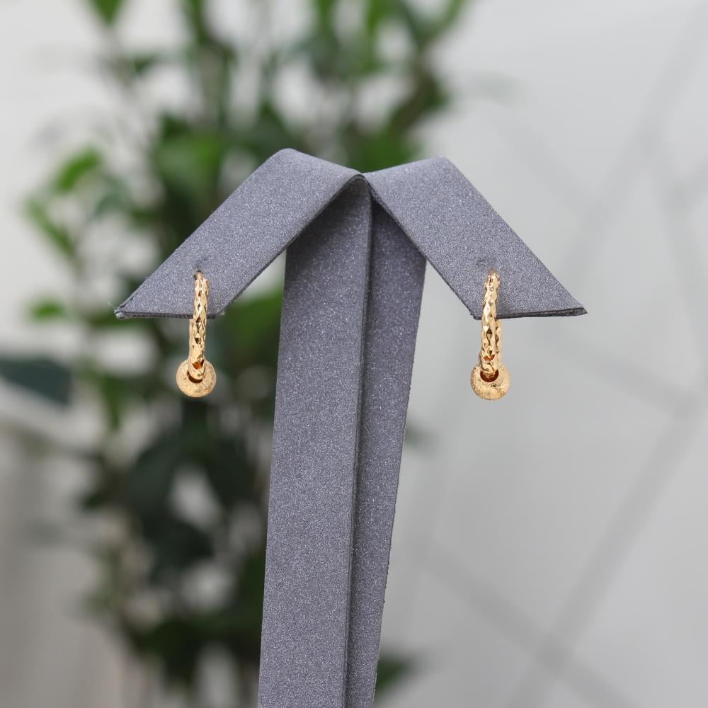 حلق كرات الذهب