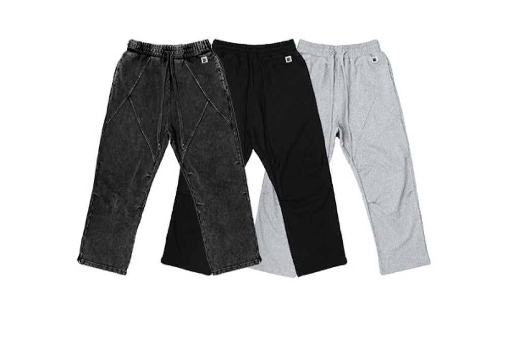 Glide Pant من Broken Box: بنطلون واسع عملي بقصة مستقيمة وتفاصيل هندسية