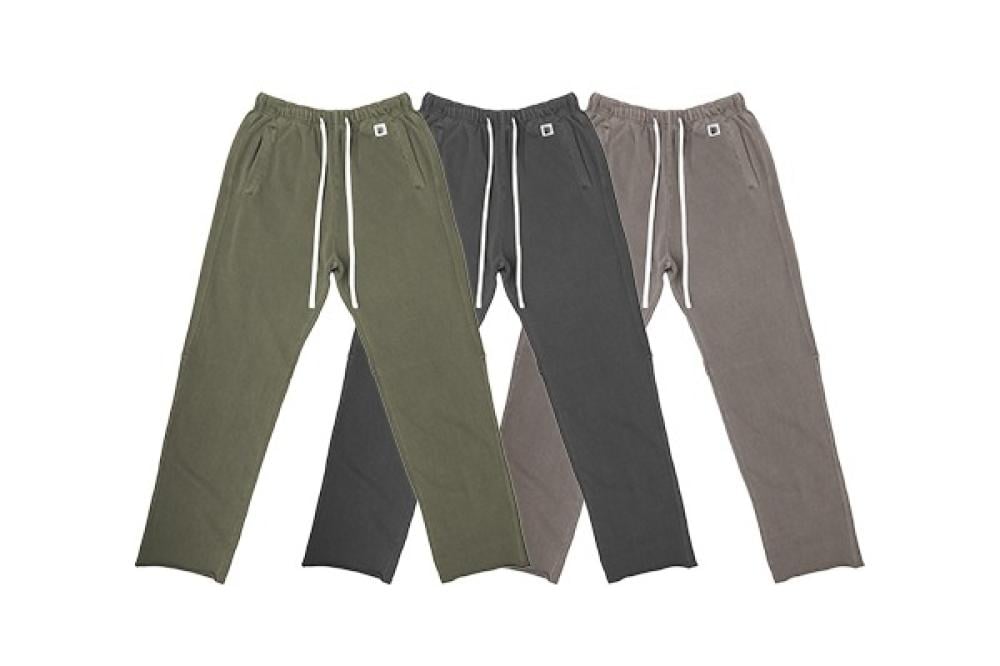 Edge Pant من Broken Box: بنطلون واسع وطويل بغسيل خاص وأطراف ملفوفة