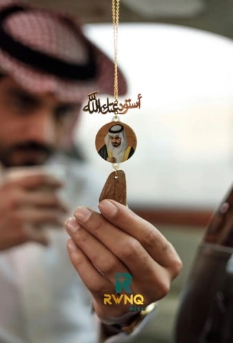 تعليقة سيارة بصورة