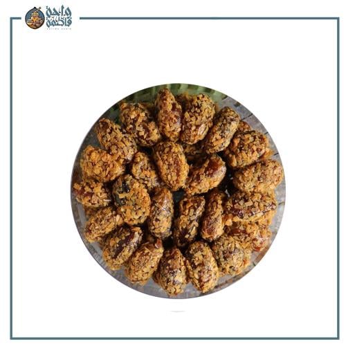 تمر خلاص الاحساء المحشي باللوز مع جوز الهند المحمص