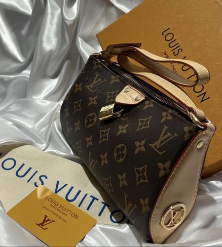 LOUIS VU TTON