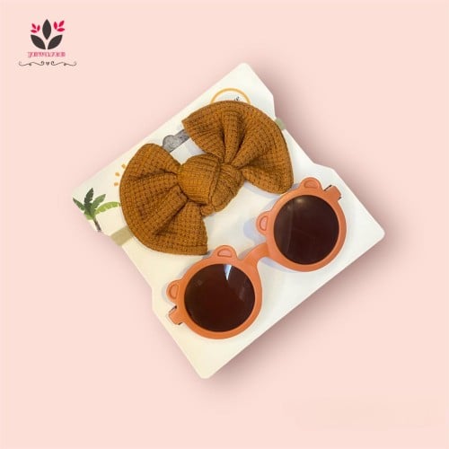 ربطة مع نظارة شمسية