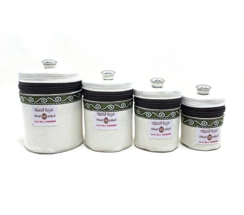 طقم علب استيل ملبس قماش ابيض مطرز من ٧ إلى ١١