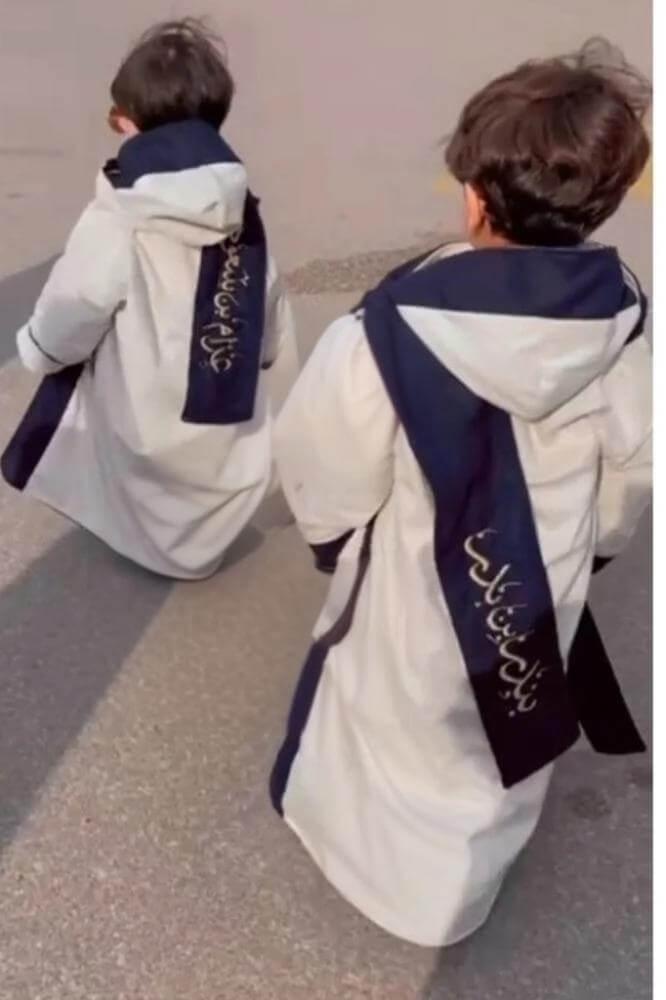 فروة جوخ شتوي اطفال فروات للاطفال بالاسم ولادي شتويه دبل فيس كحلي بيج