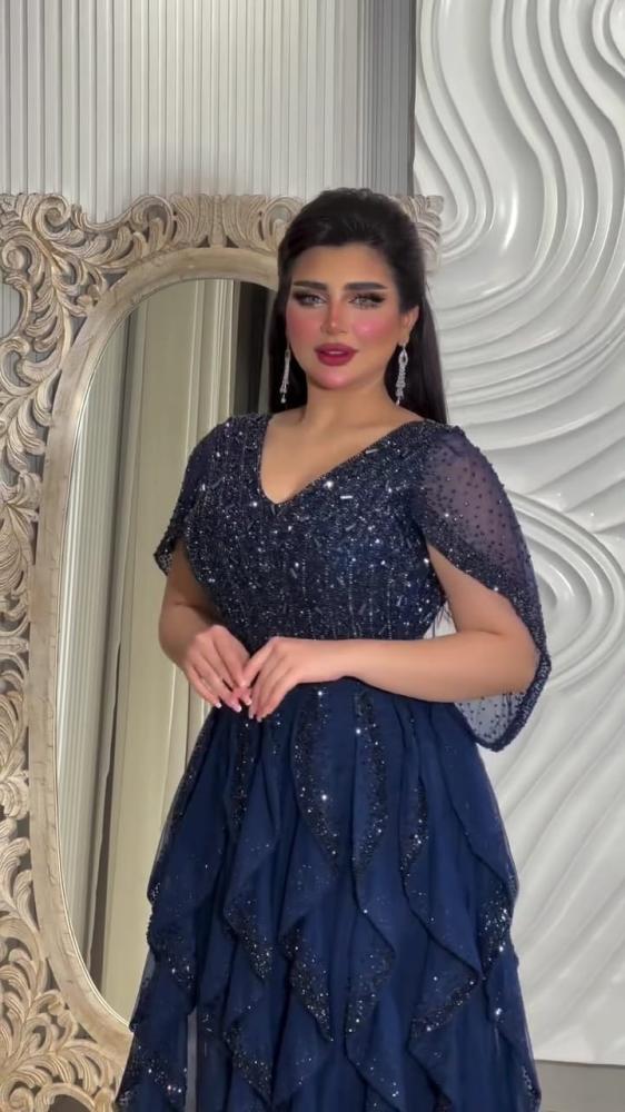 فستان سهرة طويل كحلي خرز شغل يد