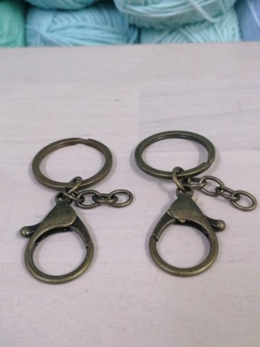 ميدالية  مفاتيح مع سلسلة ( حبتين - برونزي)