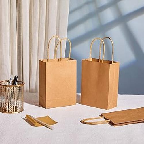 اكياس هدايا بني 12 حبه طول33 سنتم عرض 24 سنتم