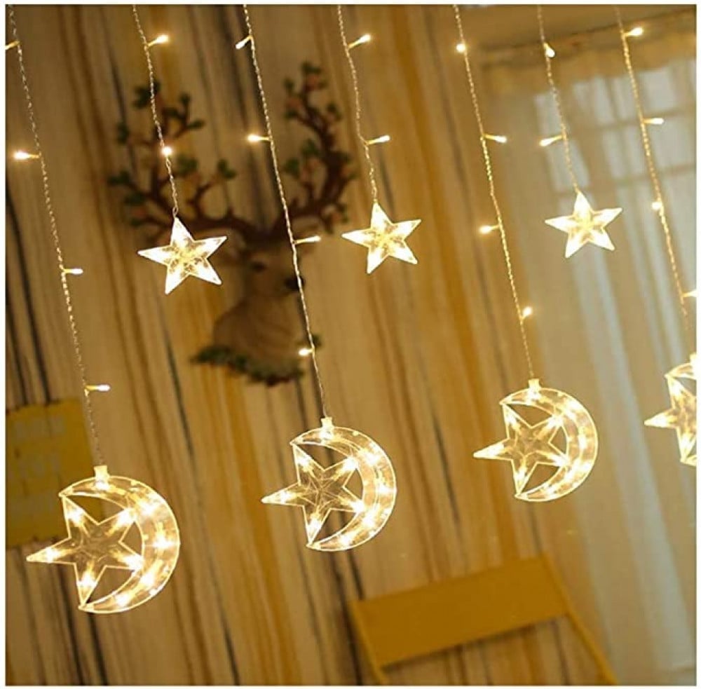 شريط اضاءة مكون من 138 مصباح LED للتعليق بديكورات مزخرفة على شكل القمر والنجوم (لون ابيض دافئ، 138.5 متر)