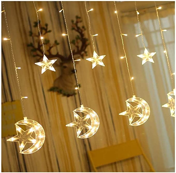 شريط اضاءة مكون من 138 مصباح LED للتعليق بديكورات مزخرفة على شكل القمر والنجوم (لون ابيض دافئ، 138.5 متر)
