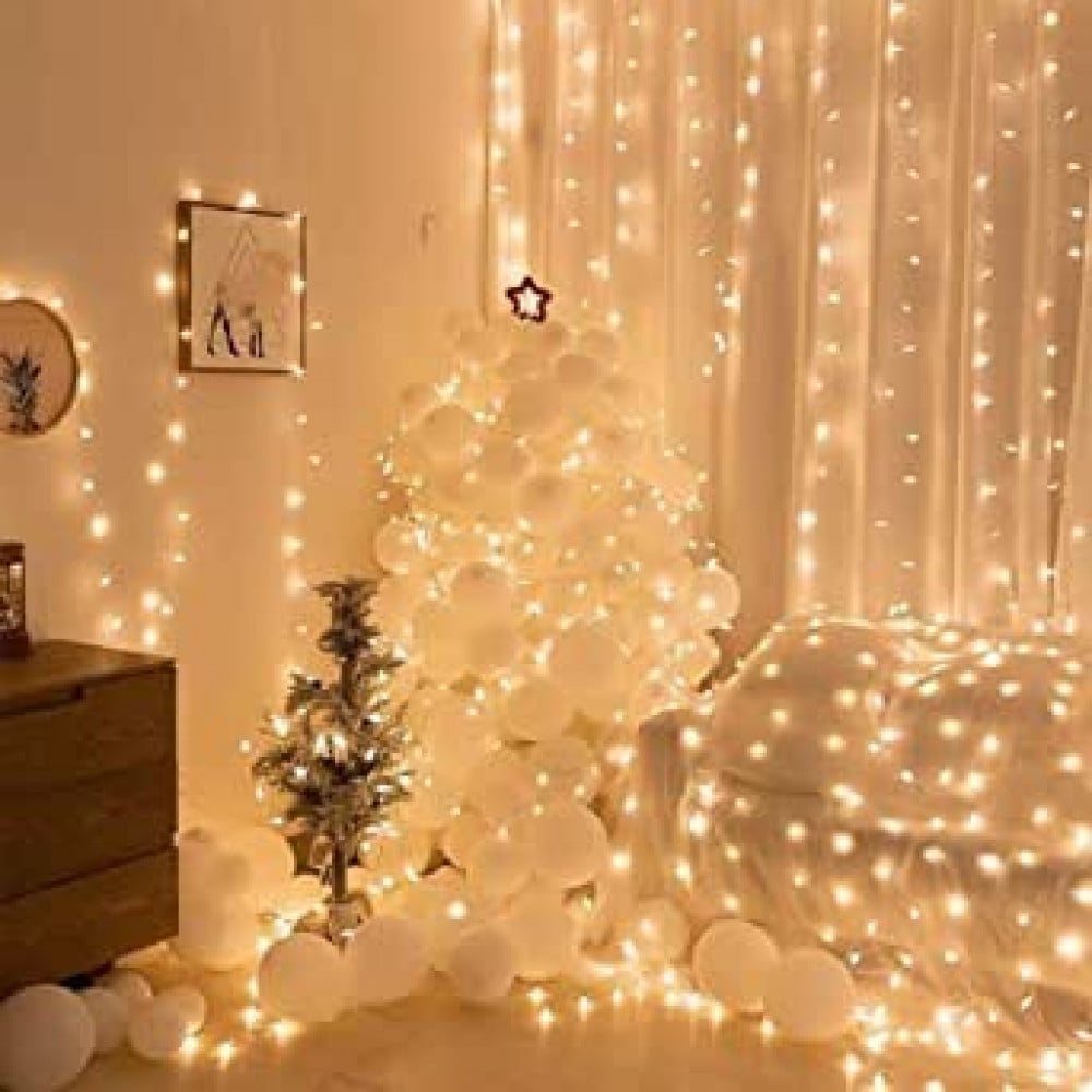 سلسلة مصابيح وامضة لديكور الستارة 3 × 3 متر من يو شوانج، سلسلة مصابيح من 300 مصباح LED تعمل عبر USB و8 اوضاع قابلة للتعديل مع جهاز تحكم لاسلكي لديكور النافذة وعيد الميلاد والكريسماس - ابيض دافئ