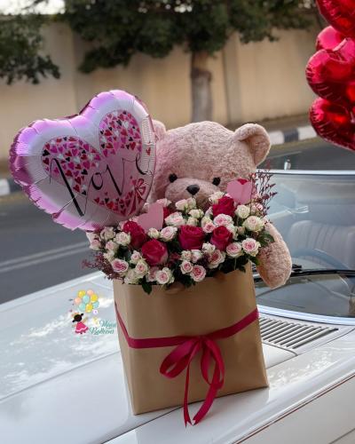 هدية دب مع ورد