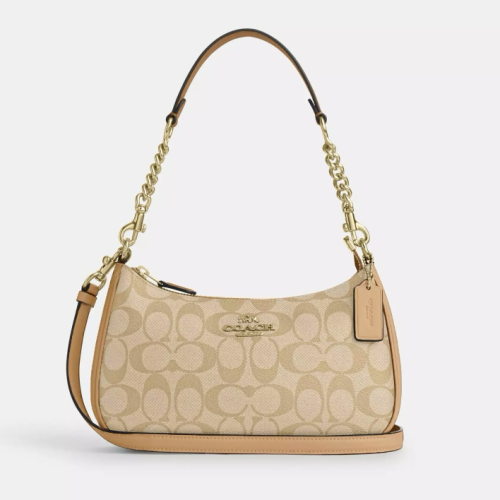 شنطة كتف كوتش COACH تيري قماش بنقشة الماركة واطراف...